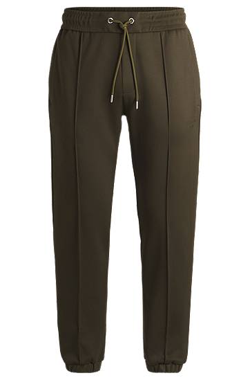 Verryttelyhousut BOSS Porsche x BOSS Tracksuit Bottoms with Seam Details Vihreä | 50537360