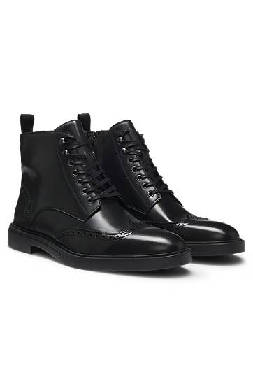 Tennarit ja kengät BOSS Leather Brogue Lace-up Boots Musta | 50552551