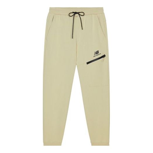 Verryttelyhousut New Balance Print Sweatpants Beige | AMP13356-BEI