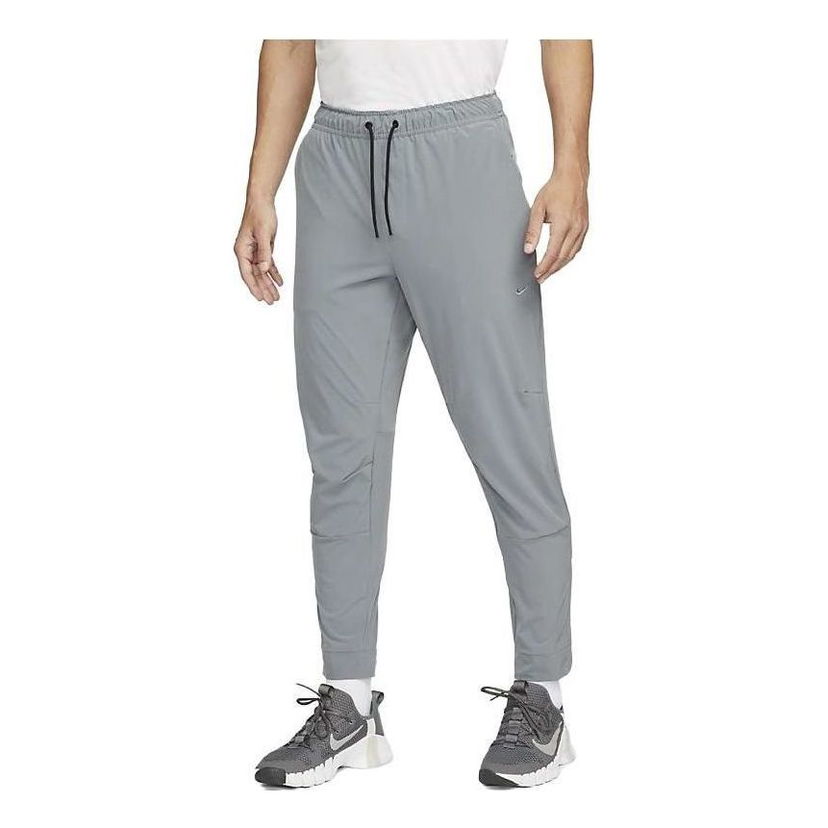Verryttelyhousut Nike Zippered Cuff Versatile Training Pants Harmaa | FB7549-084