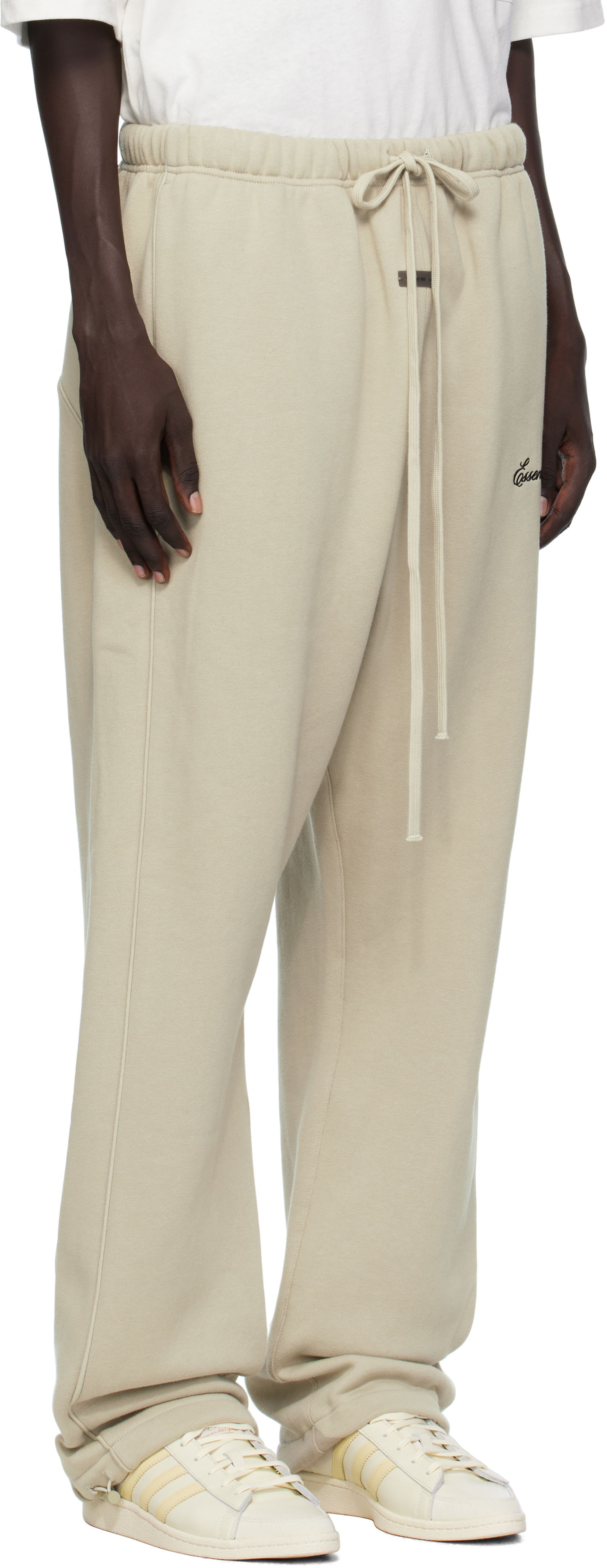 Verryttelyhousut Fear of God Fear of God ESSENTIALS Relaxed Fleece Piping Sweatpants Beige | 130SP258066F, 1