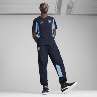 Verryttelyhousut Puma Manchester City ftblARCHIVE Woven Pants Tummansininen | 779132_73, 2