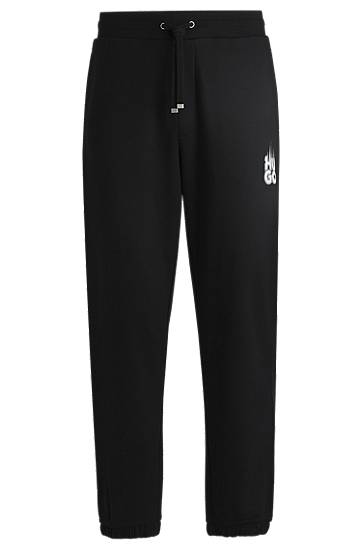 Verryttelyhousut BOSS HUGO Tracksuit Bottoms with Smoke Logo Musta | 50530435