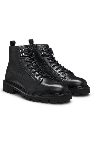 Tennarit ja kengät BOSS Grained-leather half boots with hiking-style laces Musta | 50552581