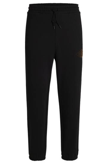 Verryttelyhousut BOSS Cotton-Terry Tracksuit Bottoms with Embroidered Logo Musta | 50534952