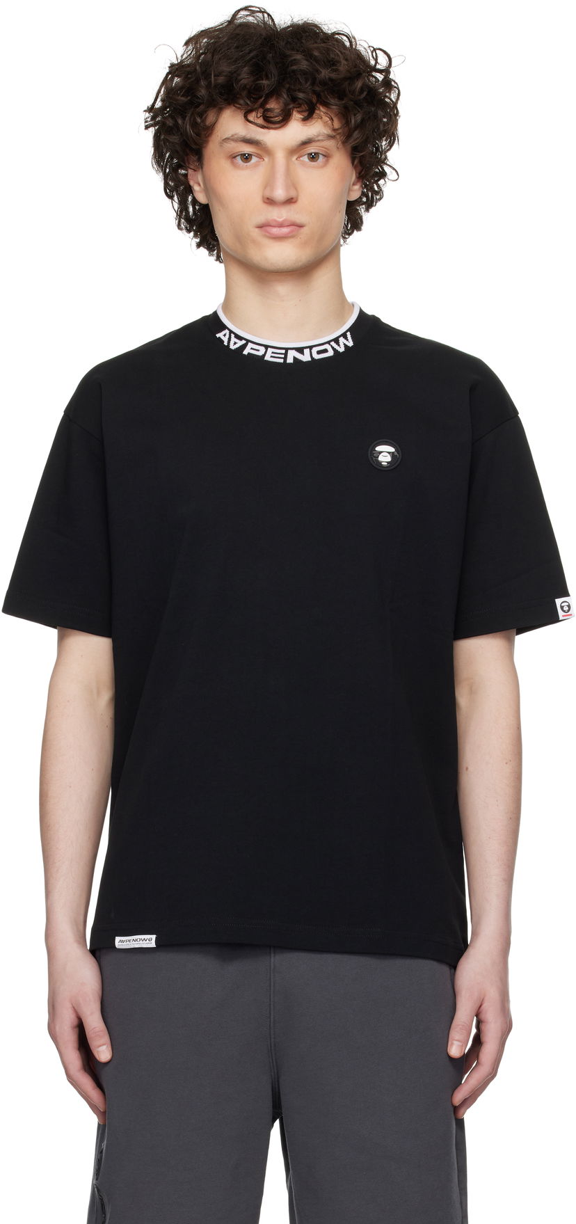 T-paita AAPE by A Bathing Ape AAPE by A Bathing Ape 'AAPE Now' Moonface Logo T-Shirt Musta | AAPTEM1604XXNBKX