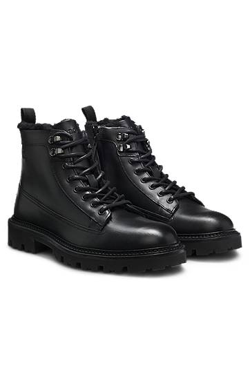 Tennarit ja kengät BOSS Leather lace-up boots with faux-fur lining Musta | 50552570