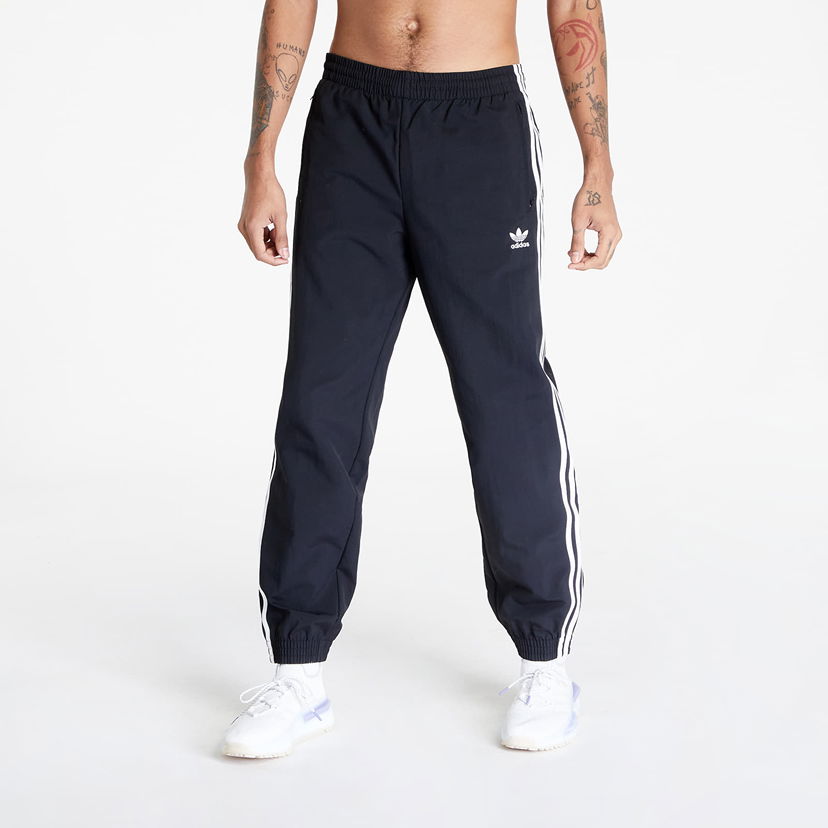 Housut ja farkut adidas Originals adidas Woven Fbird Track Musta | IT2501