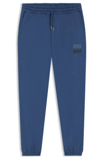 Verryttelyhousut BOSS HUGO Cotton-Terry Tracksuit Bottoms with Split Logo Sininen | 50542866
