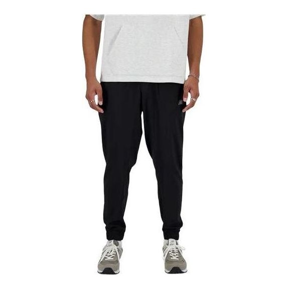 Verryttelyhousut New Balance Sport Essentials Woven Joggers Musta | MP41011-BK