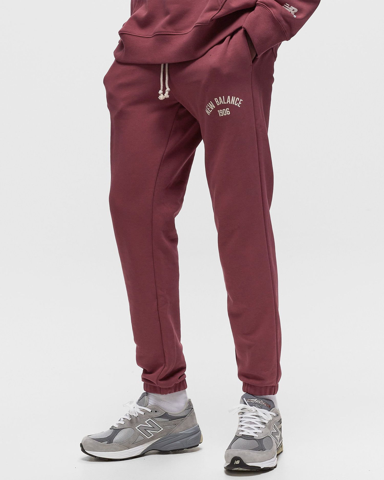 Verryttelyhousut New Balance Essentials Varsity Fleece Pant Punainen | MP33551-WAD, 1