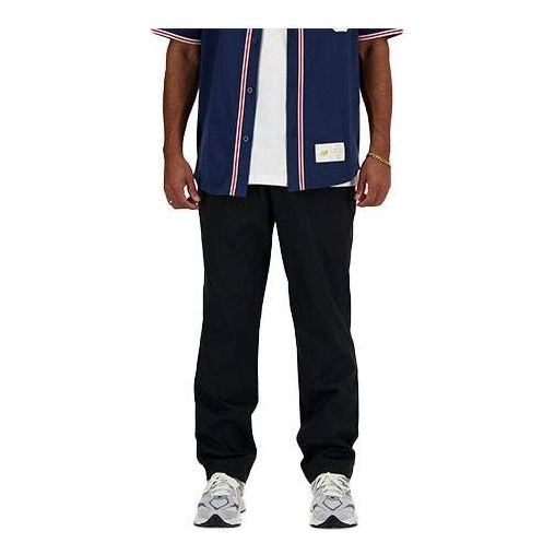 Housut New Balance Icon Twill Tapered Pants Musta | AMP41575-BK
