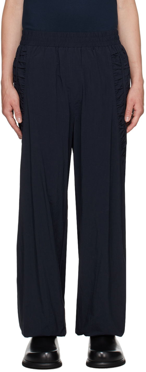 Housut sage NATION SAGE NATION Fossil Track Pants Tummansininen | S054 FOSSIL TROUSER