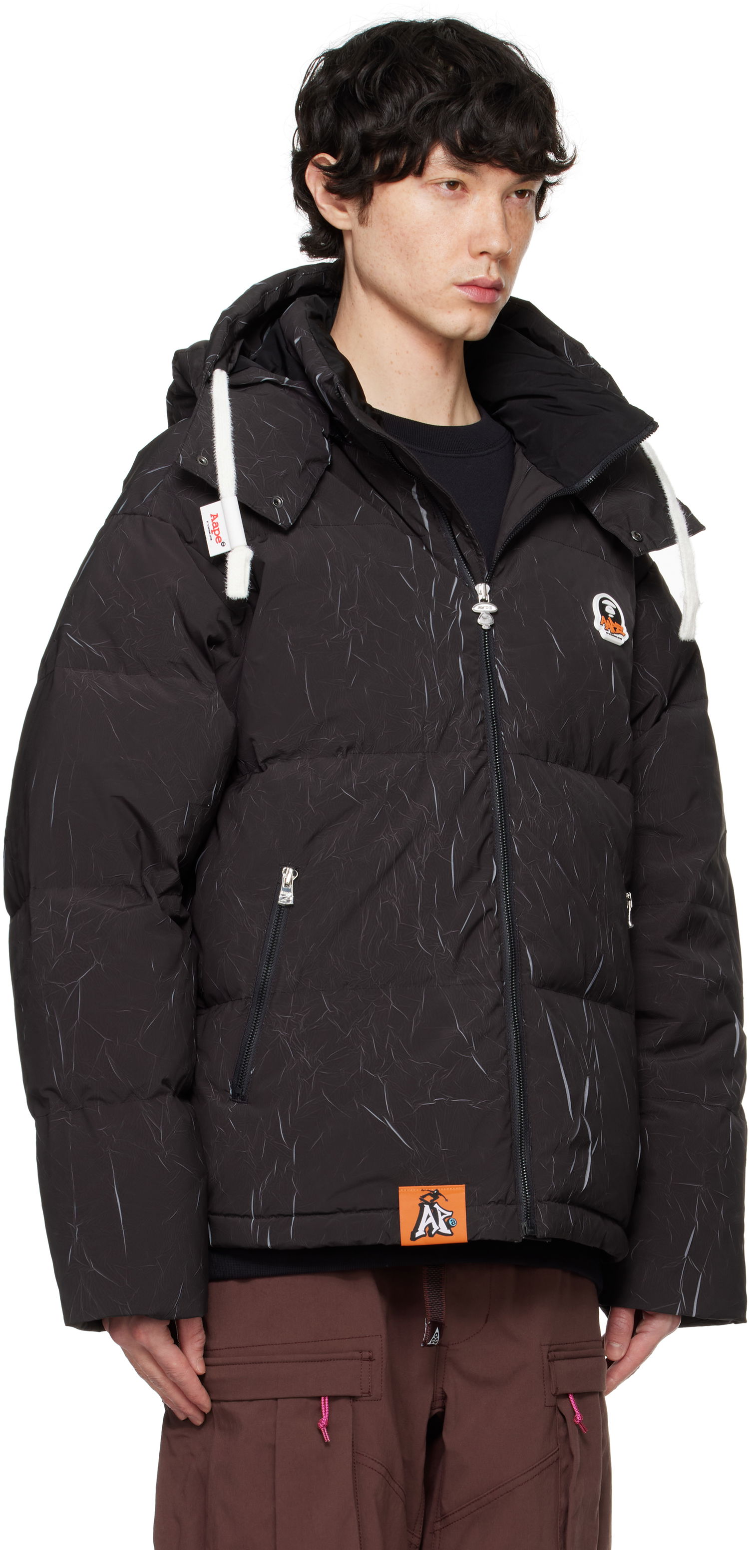 Puffer takki AAPE by A Bathing Ape AAPE by A Bathing Ape Moonface Logo Camo Hooded Down Jacket Musta | AAPDNM7665XXNBKX, 1