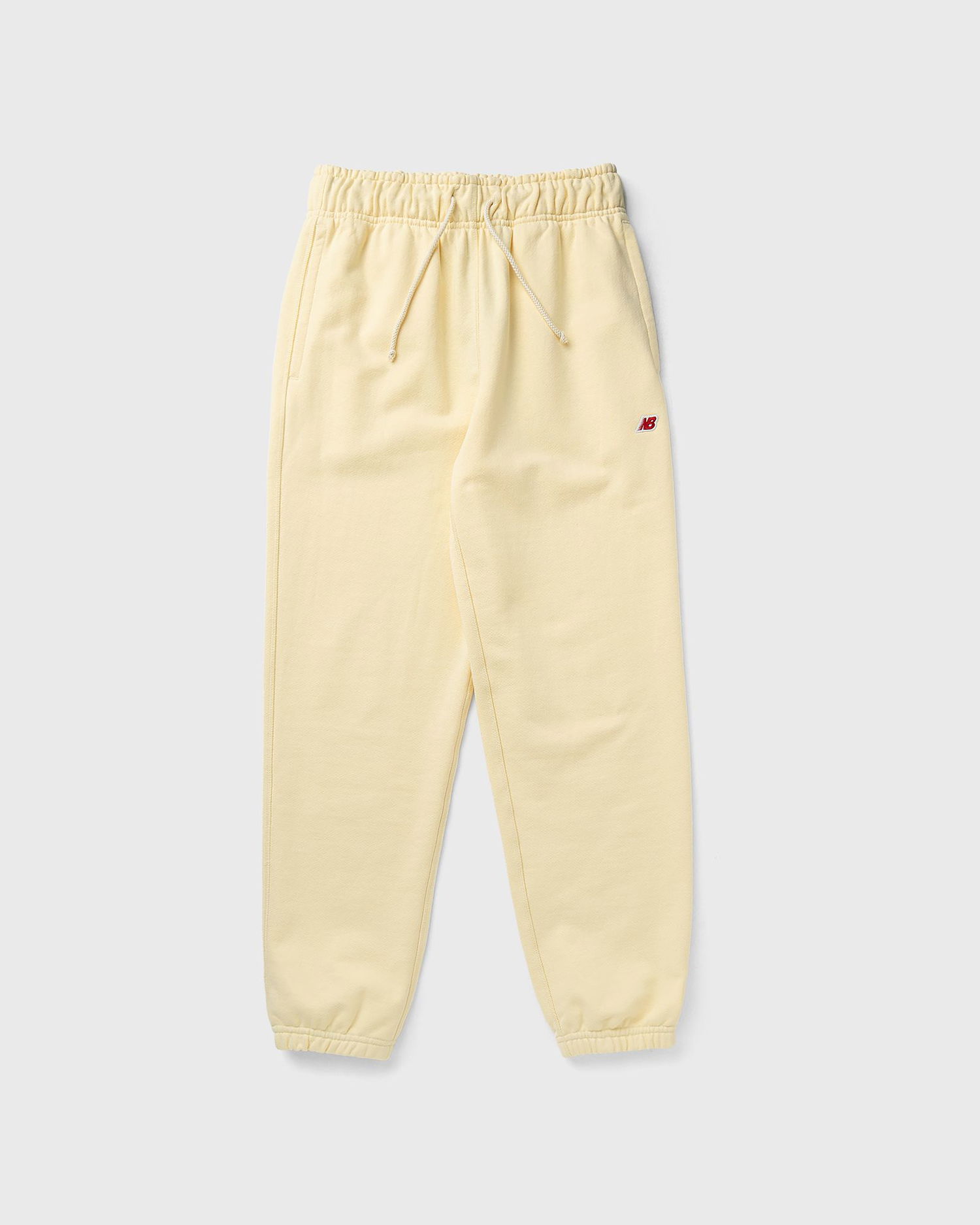 Verryttelyhousut New Balance Core Sweatpants Keltainen | MP43547-CAU, 0