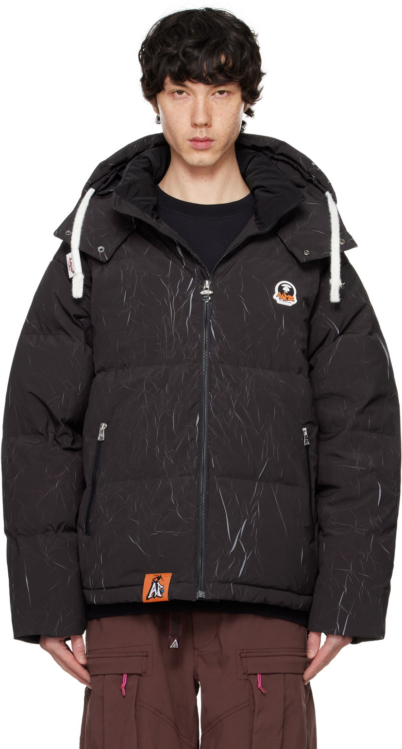 Puffer takki AAPE by A Bathing Ape AAPE by A Bathing Ape Moonface Logo Camo Hooded Down Jacket Musta | AAPDNM7665XXNBKX