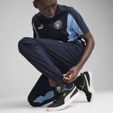 Verryttelyhousut Puma Manchester City ftblARCHIVE Woven Pants Tummansininen | 779132_73, 1