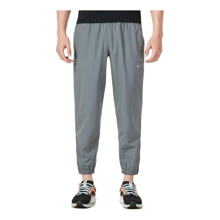 Verryttelyhousut Nike Tapered Versatile Training Pants Harmaa | FB7498-084