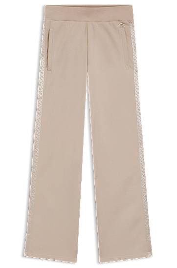 Verryttelyhousut BOSS Piqué Jersey Tracksuit Bottoms with Monogram Tape Beige | 50545655